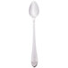 A silver Walco stainless steel iced tea spoon with a black tip on a white background.