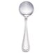 A close-up of a Walco stainless steel bouillon spoon with a beaded design on the handle.