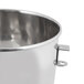 A Globe stainless steel mixing bowl with a handle.