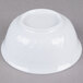 A white Thunder Group melamine bowl with a swirl design.