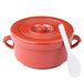 A red Thunder Group rice container with a white lid and spoon.