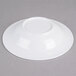 A Thunder Group white melamine bowl with a wide rim on a gray surface.