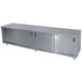 A stainless steel Advance Tabco cabinet base with a mid shelf.