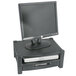 A black Kantek two tier monitor stand with a monitor on top.