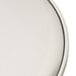 An American Metalcraft aluminum coupe pizza pan with a white surface.