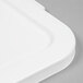 A close-up of a white Continental Huskee square trash can lid.