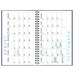 A white spiral bound calendar page with blue and green text and designs.