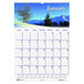 A House of Doolittle wall calendar with a scenic picture of a mountain and trees.