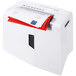 A white HSM ShredStar S10 shredder with red and white paper in it.