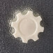A white gear wheel with "Norlake" in white on a black surface.