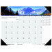 A House of Doolittle desk pad calendar with mountains in the background.