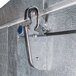 The metal door handle on a Norlake Kold Locker walk-in freezer.