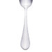 A silver teaspoon with a textured white handle.