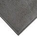 A customizable gray faux leather rectangle placemat with a close up of the leather surface.