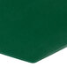 A close up of a customizable green vinyl octagon placemat.