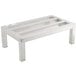 A Regency aluminum dunnage rack with metal legs and four metal slats.