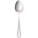 A Walco stainless steel teaspoon with a silver handle.