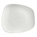A white square stoneware plate with a curved edge.