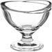 A clear glass bowl with a curved edge.