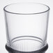 An Arcoroc highball glass with a clear bowl and round base.