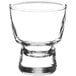An Acopa Select clear glass sake shot glass with a short rim.