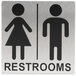 A white Tablecraft stainless steel restroom sign with man and woman pictograms.