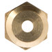 A close-up of a brass #32 Hood Orifice nut with a hole in it.