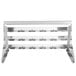 A stainless steel Matfer Bourgeat wall mounted utensil rack with a shelf.