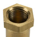 A close up of a brass threaded nut on a white background.