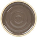 A brown stoneware plate with a beige and white circular pattern around the rim.