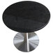 A black granite Art Marble table top with a metal base.