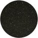 A black speckled surface with white specks on a round table top.