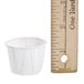A ruler measuring a Solo white paper souffle cup.