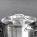 A Vigor stainless steel replacement lid on a pot.