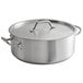 A Vigor stainless steel brazier with lid and handles.