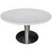 An Art Marble Furniture white round quartz table top on a metal base.