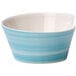 A close up of a blue and white Villeroy & Boch Aquamarine bowl with a curved edge.