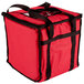 A red San Jamar insulated food delivery bag with black straps.