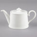A Villeroy & Boch white bone porcelain teapot with a lid.