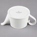 A white Villeroy & Boch teapot with a handle and spout.