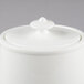 A white Villeroy & Boch bone porcelain teapot with a lid.