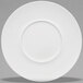 A Villeroy & Boch white bone porcelain flat plate with a round edge and a round center.
