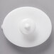 The white porcelain lid for a Villeroy & Boch teapot with a round top.