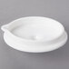 The lid for a white Villeroy & Boch porcelain teapot.