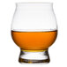 A Reserve by Libbey Kentucky Bourbon Trail Tasting Glass with brown liquid in it.