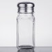 A clear glass TableCraft salt shaker with a silver lid.