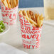 A yellow paper cup with a hot food design filled with french fries.
