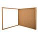 An Aarco wooden frame with a glass panel enclosing a cork board.