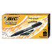 A box of 12 Bic Soft Feel black pens with black ink.