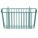 A green metal wire basket for dishes on a white background.